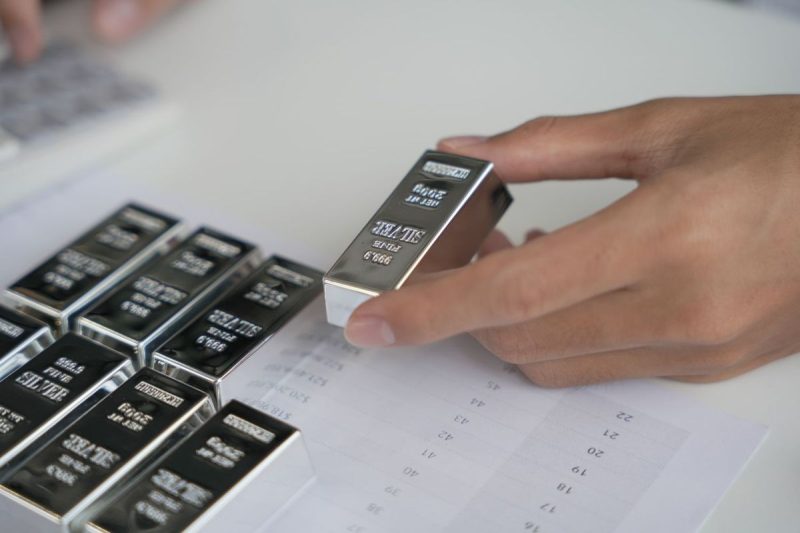 <strong>Investing in silver futures is one of many options for those interested in entering the silver market.</strong>
The highest price for silver to date was reached half a century ago, when the precious metal hit US$48.70 per ounce. With the silver price hitting US$44 per ounce following the US Federal Reserve’s September 2025 rate cut, investors are wondering if the white metal will it break past its record. Some silver bulls believe that could happen in the near future, with a few market insiders even calling for a triple-digit silver price.
Trading silver futures is not the same as owning physical bullion, but it’s a popular strategy for advanced investors with a higher risk tolerance. Read on to learn more about how silver futures work and what role they can play in a portfolio.
                            What are silver futures?                                
Silver futures trading involves an agreement between a buyer and a seller in which physical silver will be bought by the buyer and delivered by the seller for a fixed price at a date set in the future.
Most traders (especially short-term traders) aren’t concerned about delivery when it comes to silver futures — they typically use cash to settle their long or short positions before they expire or defer them to the next available delivery month. Overall, very few silver futures contracts traded each year actually result in the delivery of the underlying commodity.
                            What exchanges are silver futures traded on?                                
Silver futures can be traded on various global exchanges, but the COMEX is a common option. The COMEX is one of four exchanges that make up CME Group, which bills itself as the world’s leading derivatives marketplace. 
On the COMEX, monthly silver futures contracts are listed for the current calendar month or the following two calendar months, plus any January, March, May or September within a 23 month period. July and December are also included should they fall within a 60 month period, beginning with the current month. The material offered must assay to a minimum of 999 fineness.
According to Investopedia, silver futures on the COMEX are quoted in US dollars per troy ounce and are traded in units of various sizes, ranging from 1,000 (known as micro contracts) to 2,500 (E-mini contracts) to 5,000 (full contracts) troy ounces. For example, a price quote of US$24 for 5,000 troy ounces would cost approximately US$120,000.
In the case of a full contract, investors who wait for their silver futures to mature will either receive or deliver a 5,000 troy ounce COMEX silver warrant for a full-sized silver future, depending on if they are the buyer or the seller. One warrant entitles the holder to ownership of equivalent bars of silver in designated depositories, such as with the The Brink’s Co  (NYSE:BCO), HSBC Holdings (NYSE:HSBC, LSE:HSBA), Manfra Tordella & Brookes, Delaware Depository and JPMorgan Chase & Co. (NYSE:JPM).
The COMEX settlement process is different for smaller silver futures contracts.
Silver futures are also traded electronically on the Indian National Commodity & Derivatives Exchange (NCDEX), the Dubai Gold & Commodities Exchange (DGCX), the Multi Commodity Exchange of India (MCX) and the Tokyo Commodity Exchange (TOCOM).
                            Why invest in silver futures?                                
Silver typically follows in the footsteps of gold and is considered a safe-haven asset. Investors tend to flock to precious metals in times of turmoil, which bumps up demand, and if gold is too expensive, silver is a cheaper option.
Futures offer a limit on potential losses to buyers, which attracts those interested in hedging. Hedgers such as producers, portfolio managers and consumers often use futures to mitigate price risk — their goal is to protect themselves from inflation and to reap the rewards of favorable price movements. On the flip side, speculative investors can use silver futures to gain exposure to the white metal while only putting up a fraction of the total cost for a contract.
Of course, silver has equal potential to suffer large losses in the futures market — due to the leverage involved, investors can lose funds in their accounts quickly. For that reason, experts often encourage inexperienced market participants to avoid the futures market until they have a good idea of their desired risk profile, time horizon and cost considerations.
<strong>Securities Disclosure: I, Melissa Pistilli, hold no direct investment interest in any company mentioned in this article.</strong>
This post appeared first on investingnews.com What are Silver Futures?